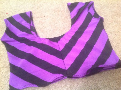 Crop top. Looks better on.