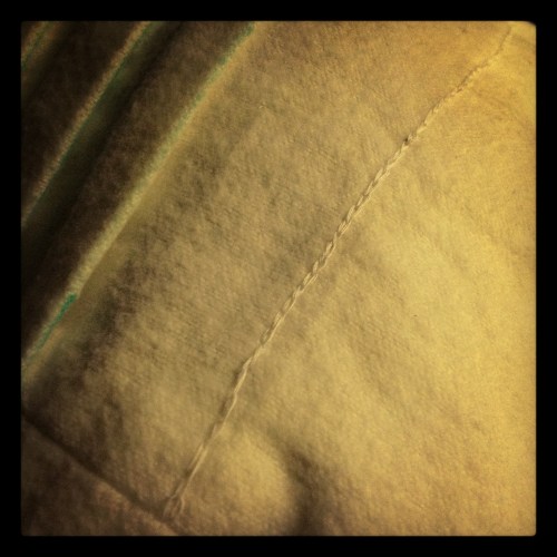 Chain-stitched hem. Started bad, got only slightly better.