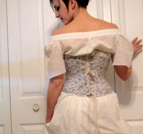 Corset back. Lace job by the fourteen-year-old.