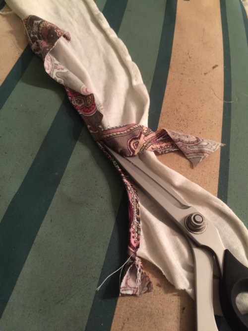 Trim the excess off the back.