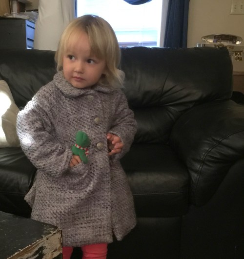 With bear in pocket.